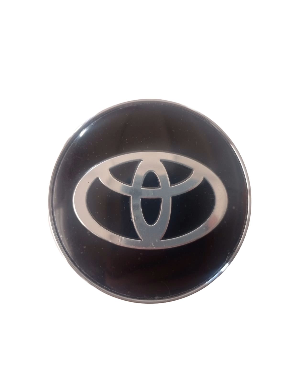 Tapa central Toyota Negra Logo Plateado